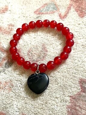 Red Beaded Bracelet with Black Heart Pendant